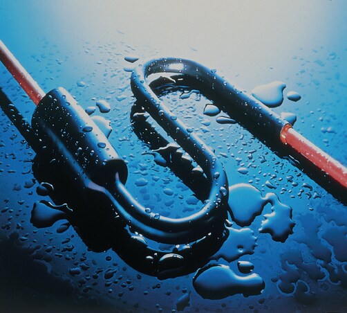 Lipnus susitraukiantis izoliacinis vamzdelis